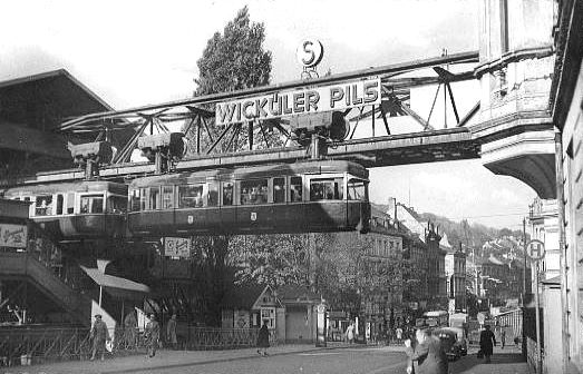 EU/D/NRW/W/Elberfeld/Robert-Daum-Platz/SW-AK_EU_D_NW_W-Elberfeld_Tannenbergstrasse_Schwebebahn_um_1955